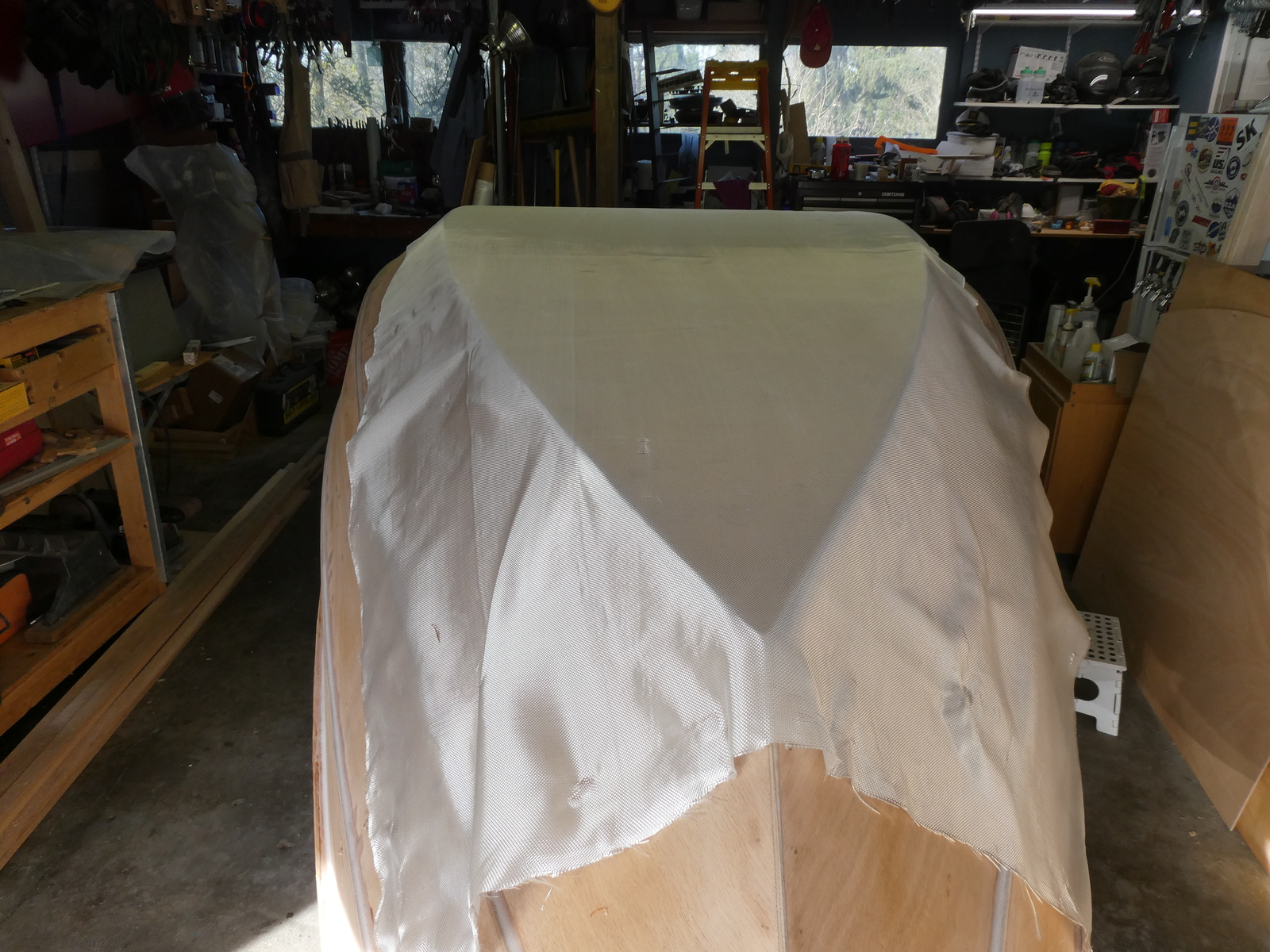 Draping the cloth over the hull bottom